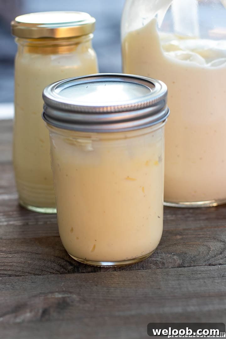 Homemade mayonnaise in jars with tight-fitting lids
