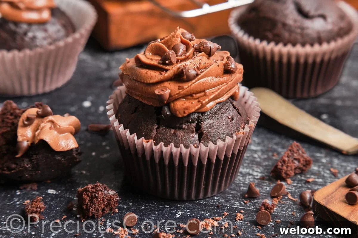 Landscape image of a moist chocolate cupcake.