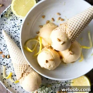 A cropped image of scoops of lemon ice cream in a bowl