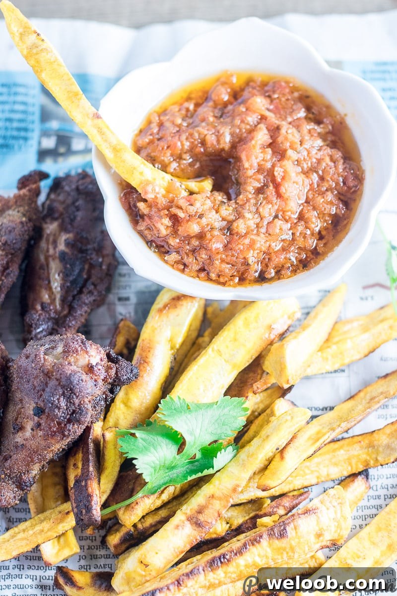 Plantain Fries with dipping sauce and wings.