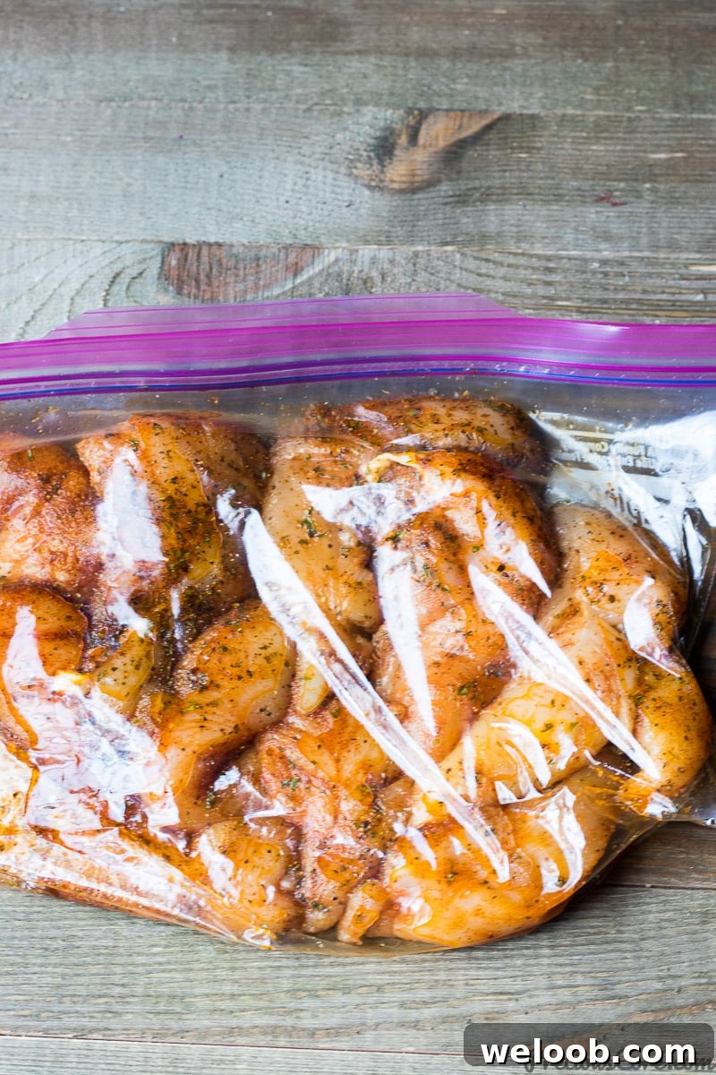 Chicken tenders marinated in a Ziploc bag
