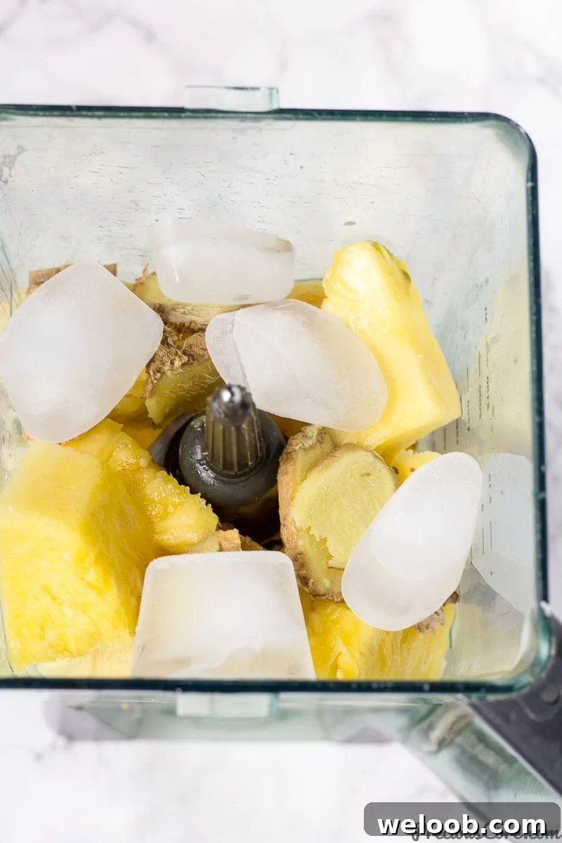 Pineapple Ginger Juice ingredients in blender