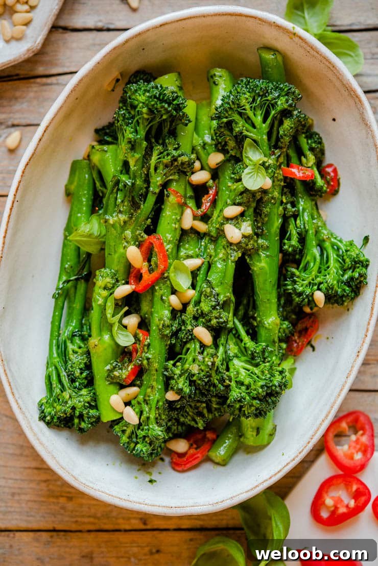 A close up of sauteed broccolini in a bowl