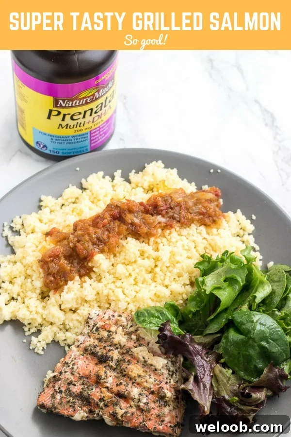 Plate of food with a bottle of Nature Made prenatal vitamins with text "Super Tasty Grilled Salmon So good!"