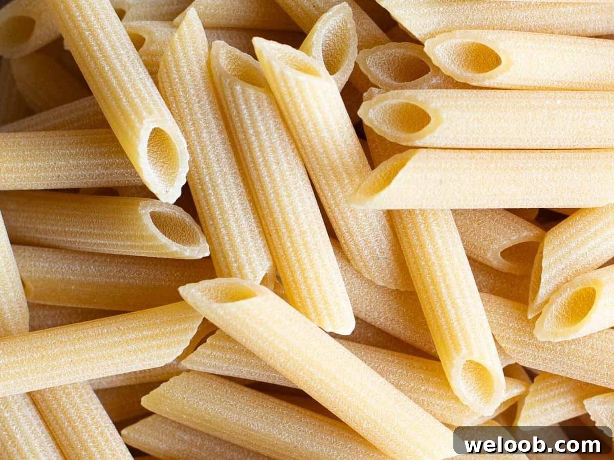 A close up of penne pasta.