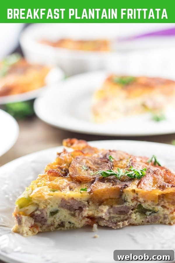 Slice of plantain frittata on a white plate.