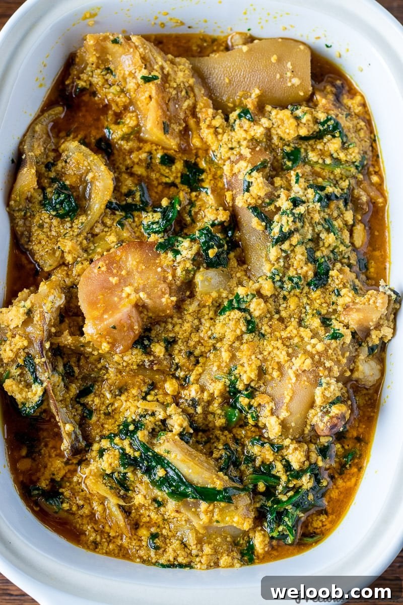 Close-up shot of egusi soup in a bowl.