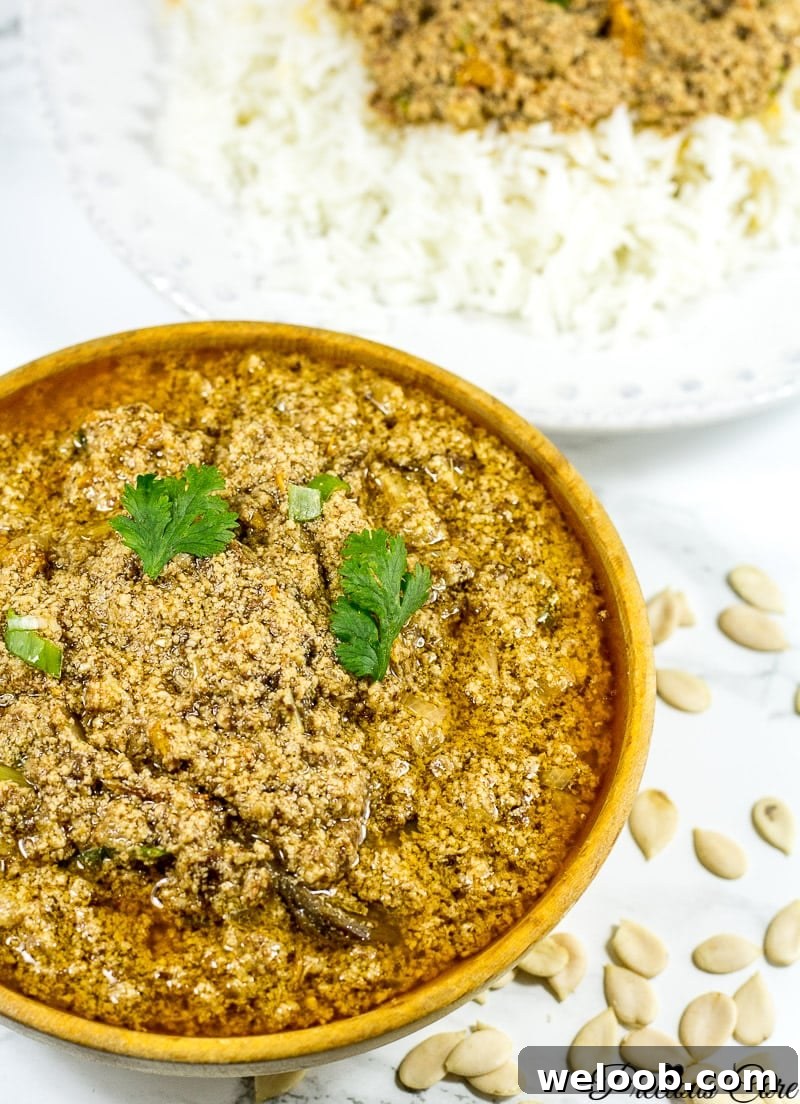 Egusi Stew in a wooden bowl.