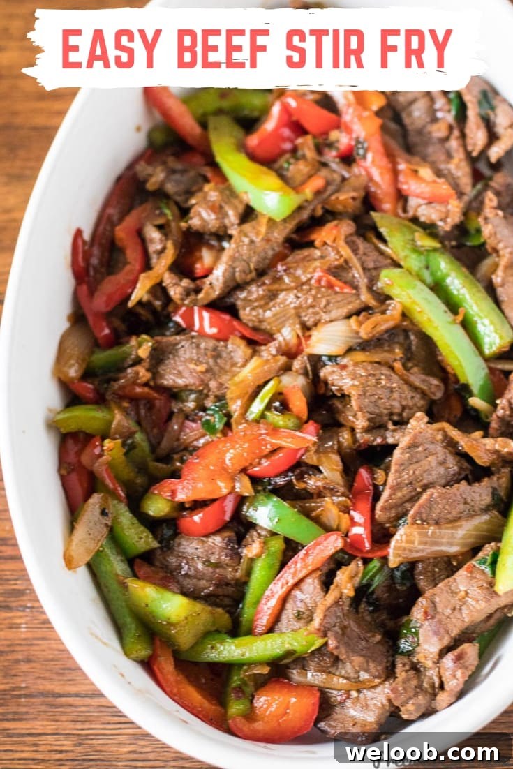 Easy Beef Stir Fry in a white bowl.