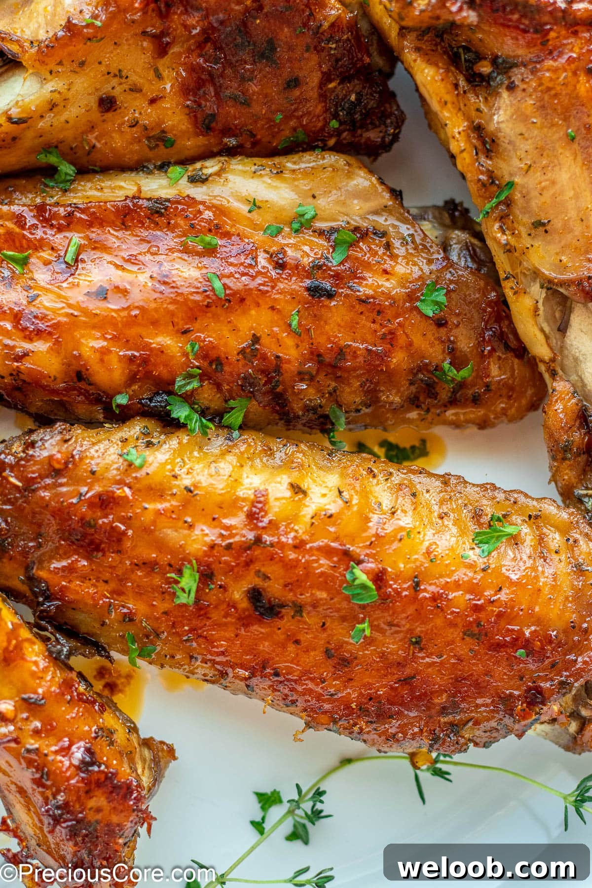 Oven Baked Turkey Wings in a white bowl.