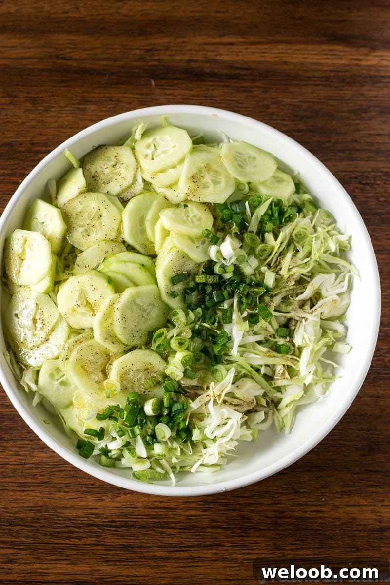 Cabbage Salad in a white bowl.