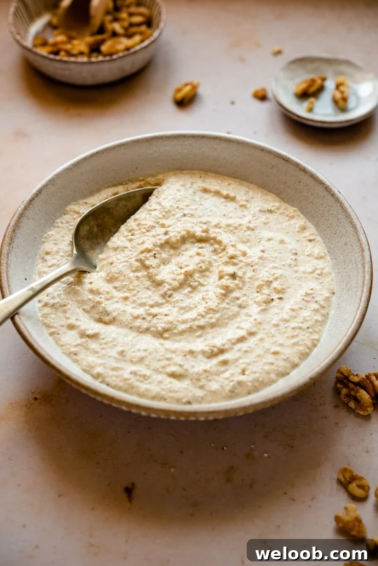 Walnut sauce, salsa di noci in a rustic bowl
