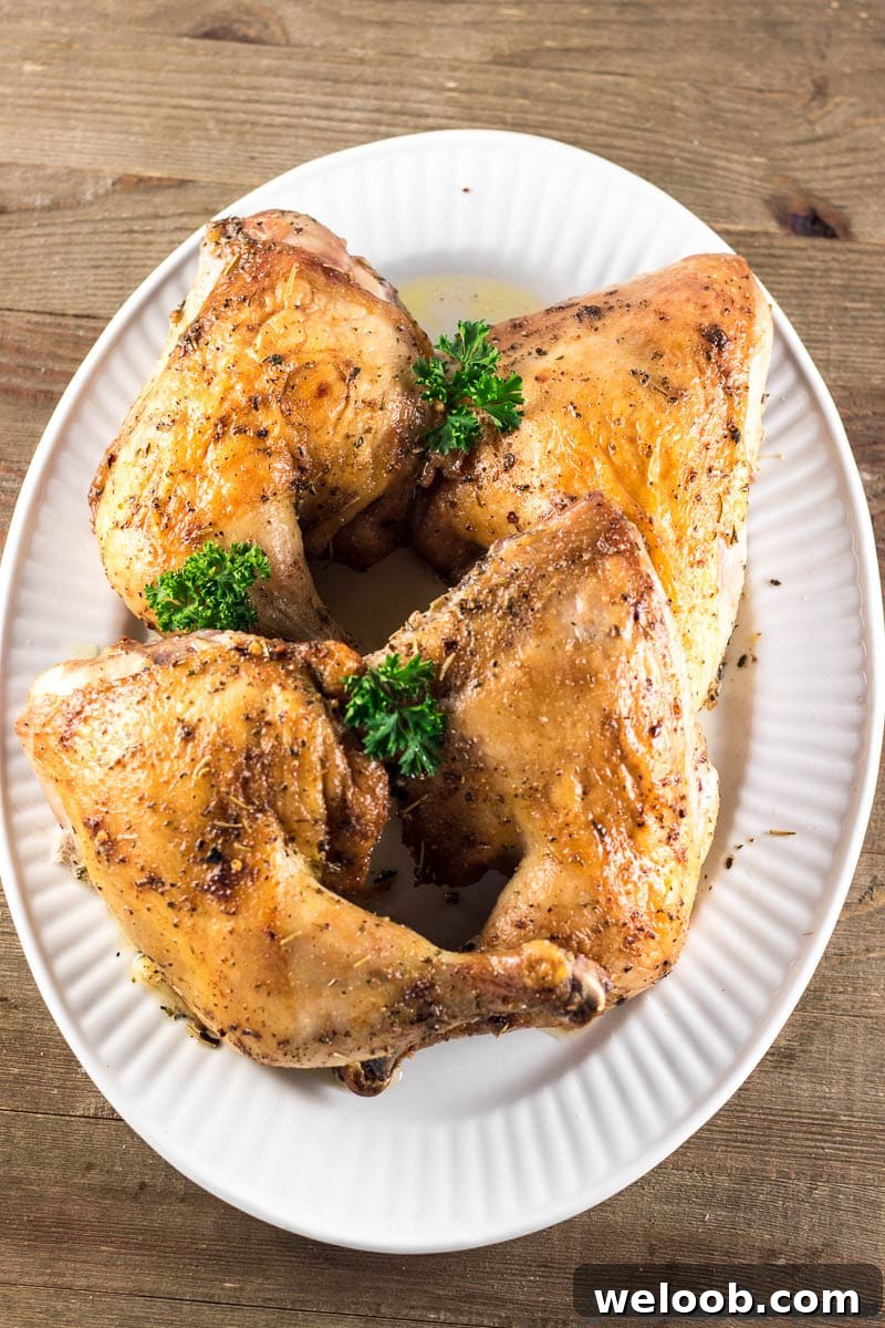 Chicken leg quarters on serving tray 