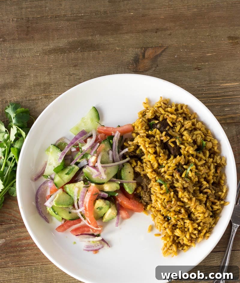 Pilau and Kachumbari on a plate