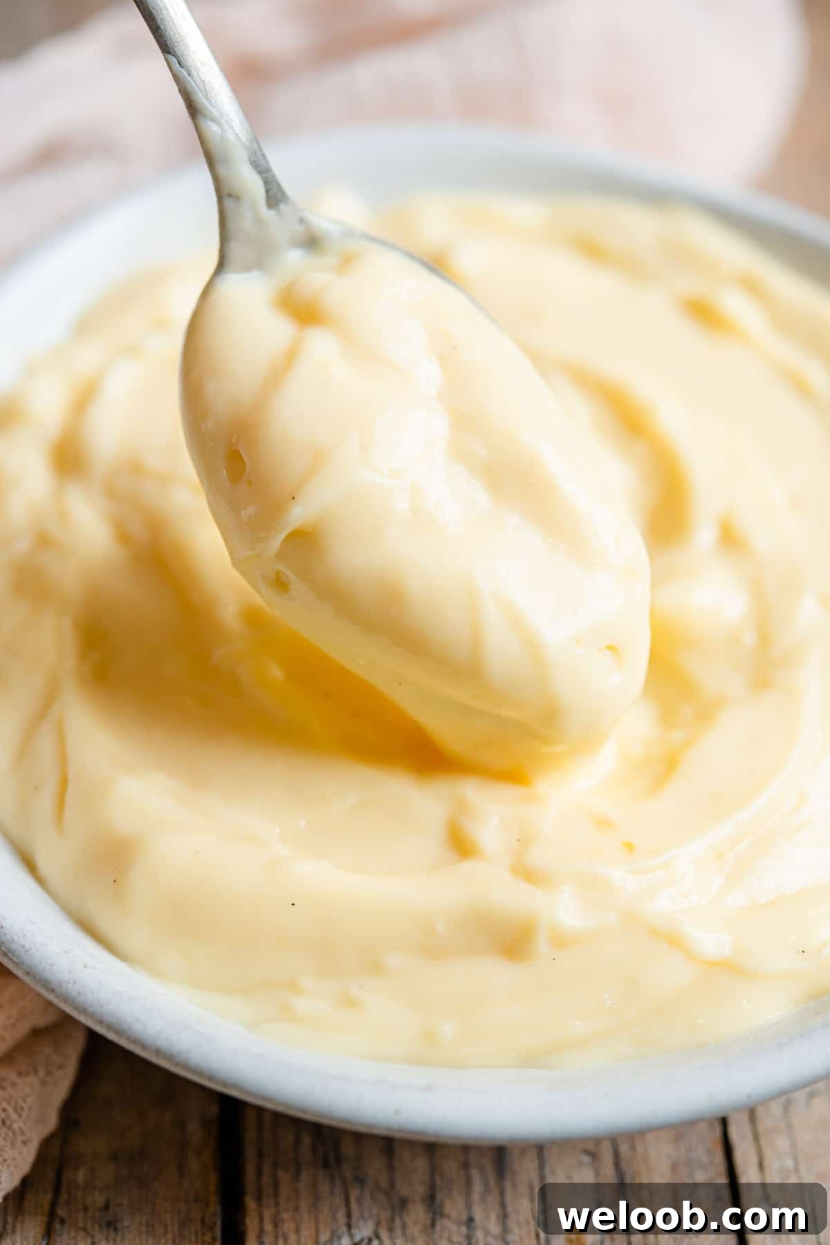 A close up of a spoonful of Italian pastry cream