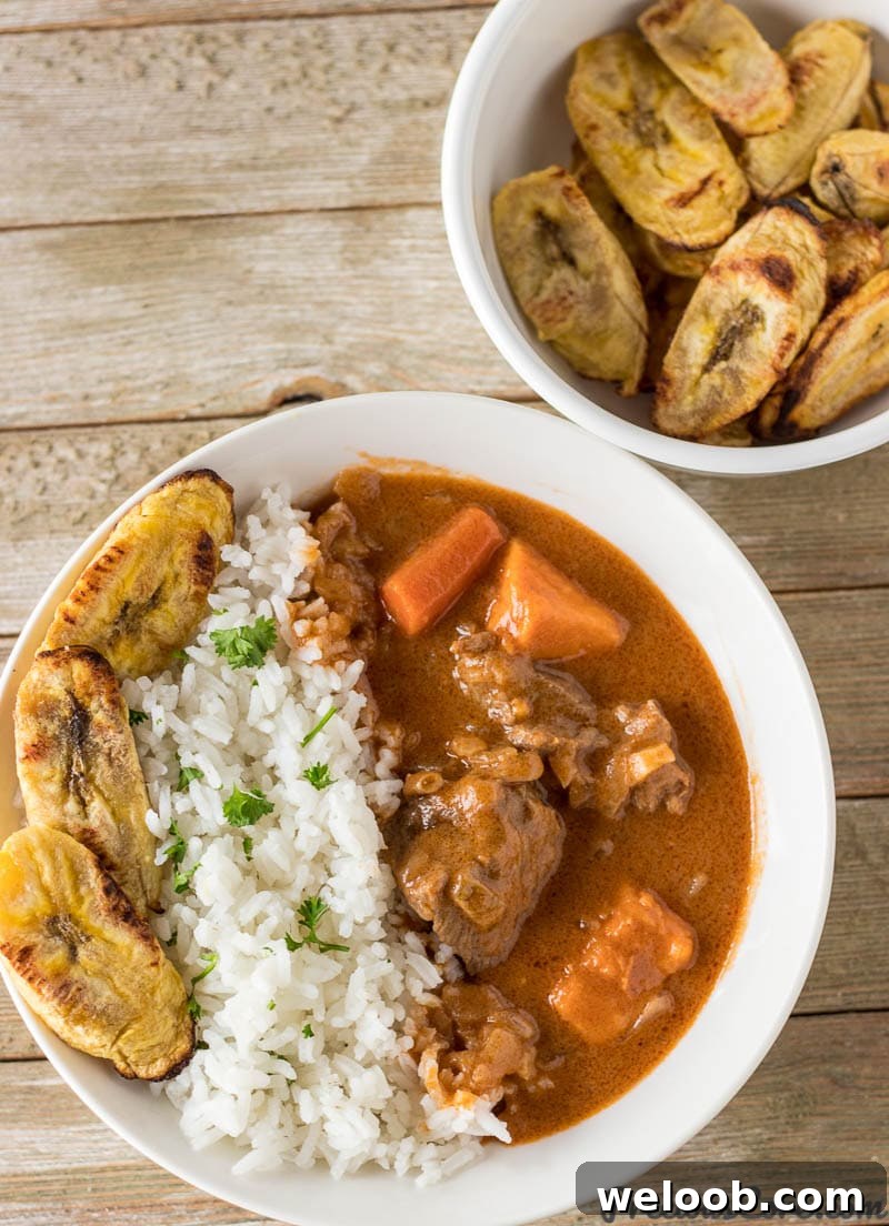 African Peanut Butter Stew served with rice and plantains