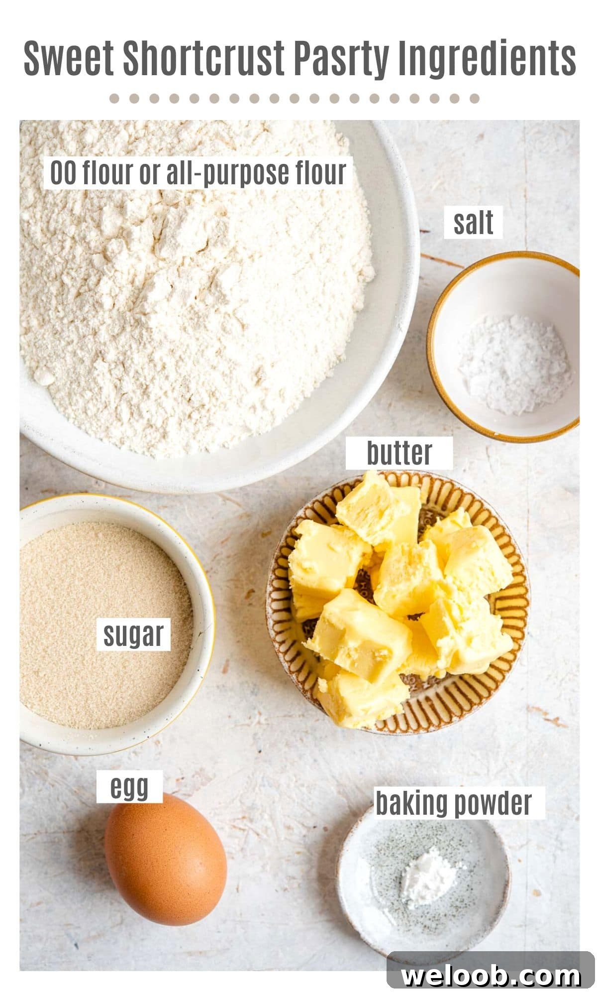 An overhead shot of all the ingredients needed to make sweet shortcrust pastry