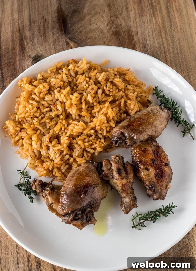 Jerk chicken on a plate and rice