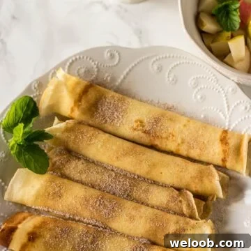 Perfect French Crepes: Thin, Tender, and Ready in Minutes 8 Crepes Served with diced apples and pears in a bowl and coffee