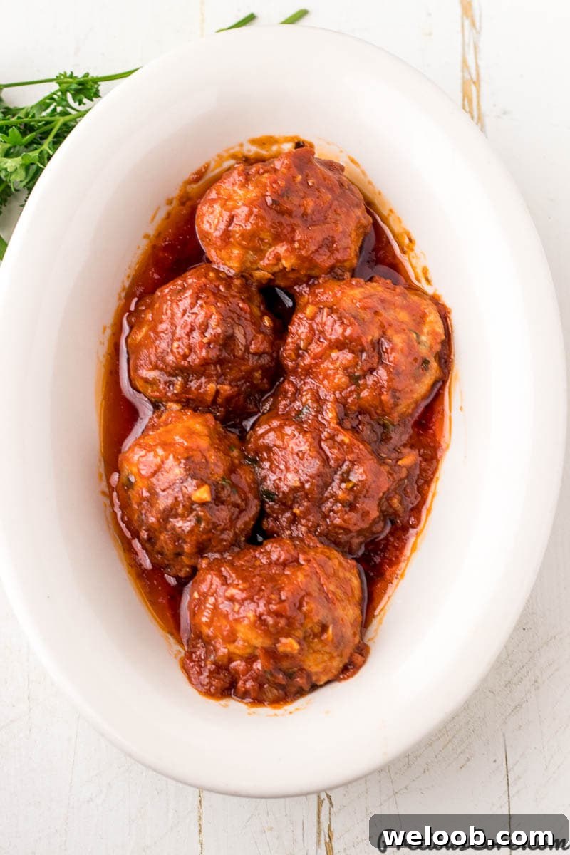Juicy Baked Chicken Meatballs with Garlic Parmesan Sauce 3 Bowl of chicken Meatballs for Spaghetti