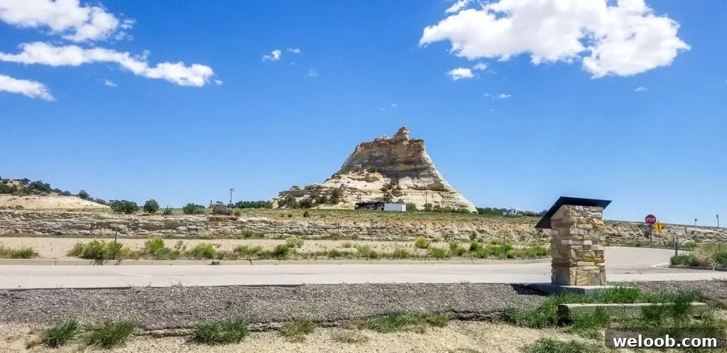 White hill under a blue sky.
