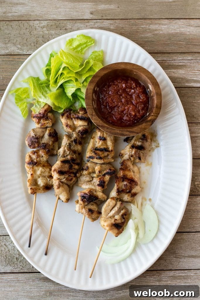 Chicken skewers on serving platter