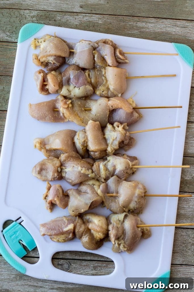 Raw chicken on skewers