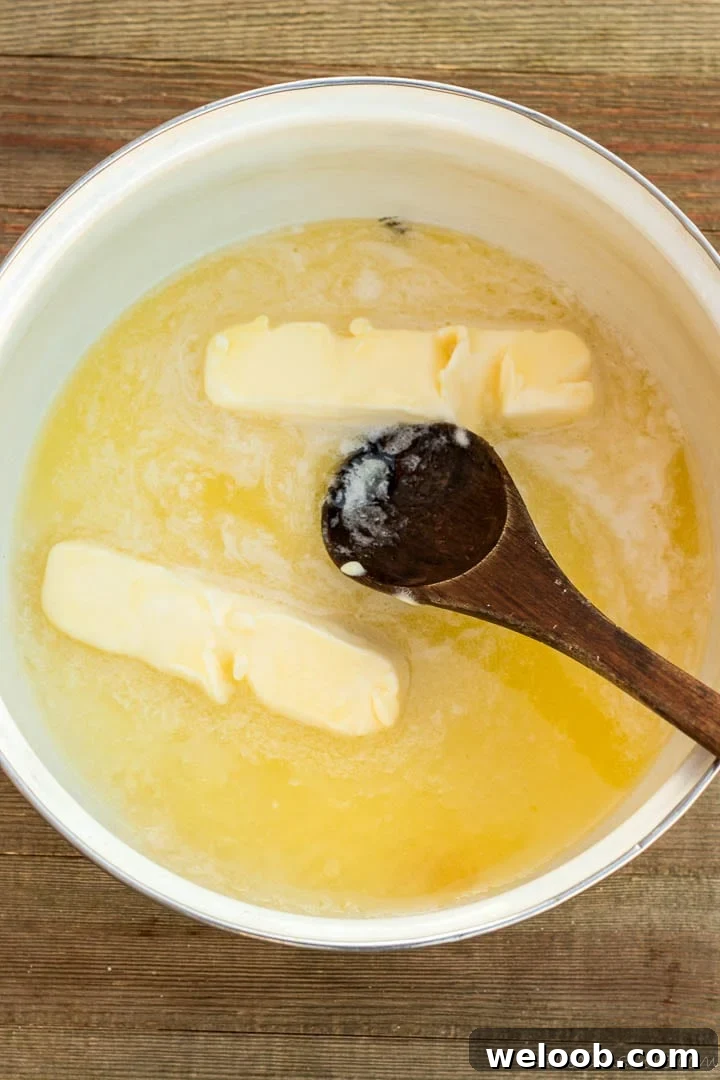 Butter and sugar in a pot.