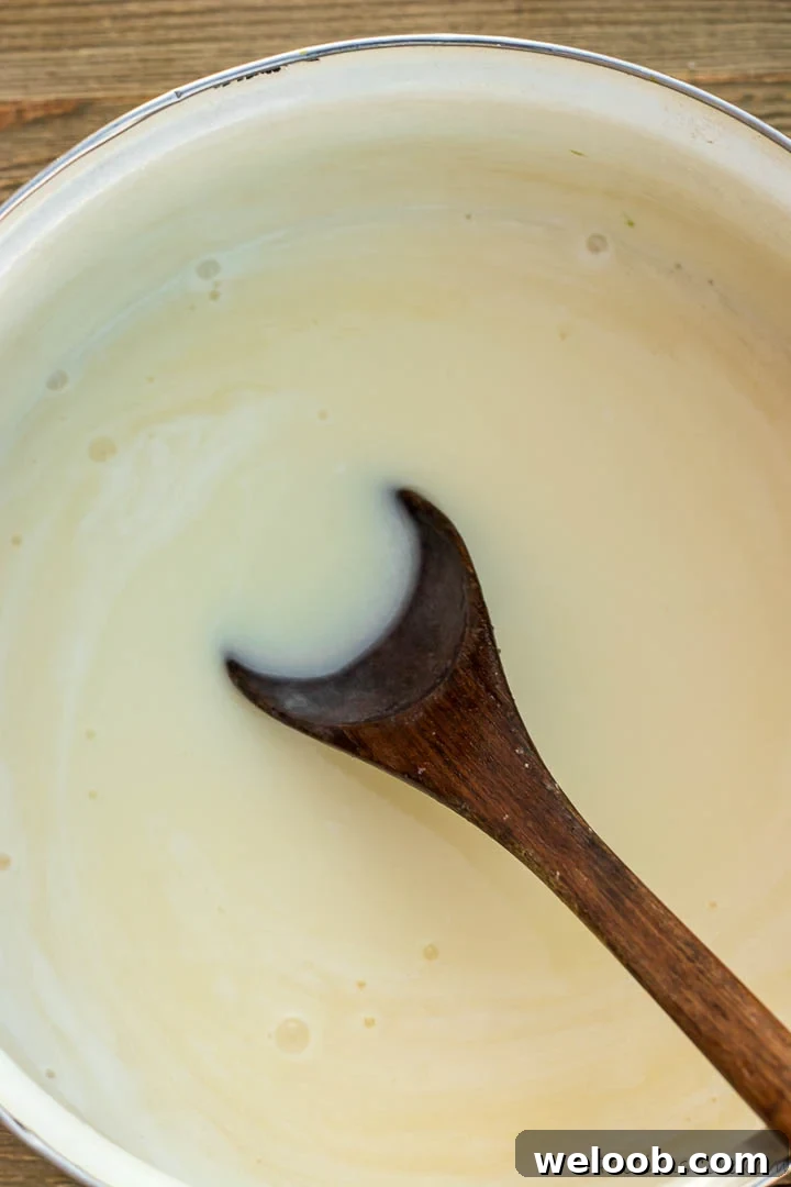 Bread pudding sauce with coconut milk in pot