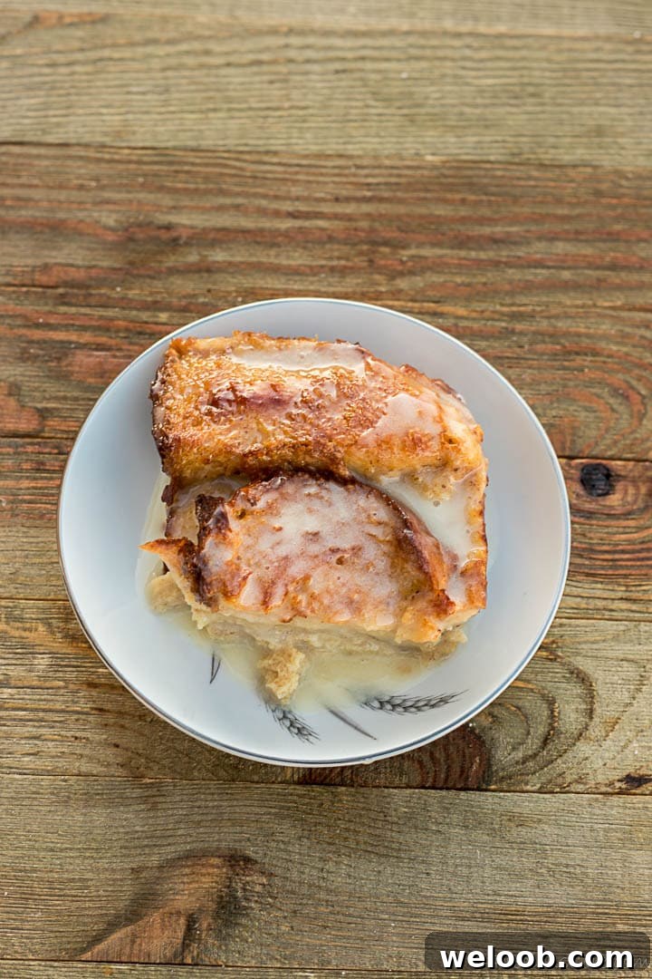 Serving of bread pudding on a dessert plate