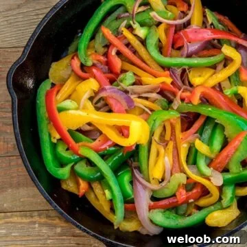 sauteed peppers in a cast iron skillet