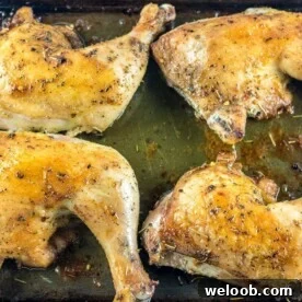 Baked Chicken Leg Quarters on baking tray