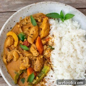 coconut curry chicken and rice in a bowl