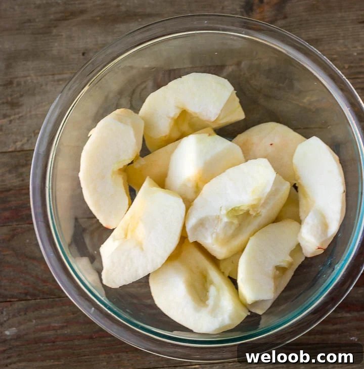 Bowl of peeled apples