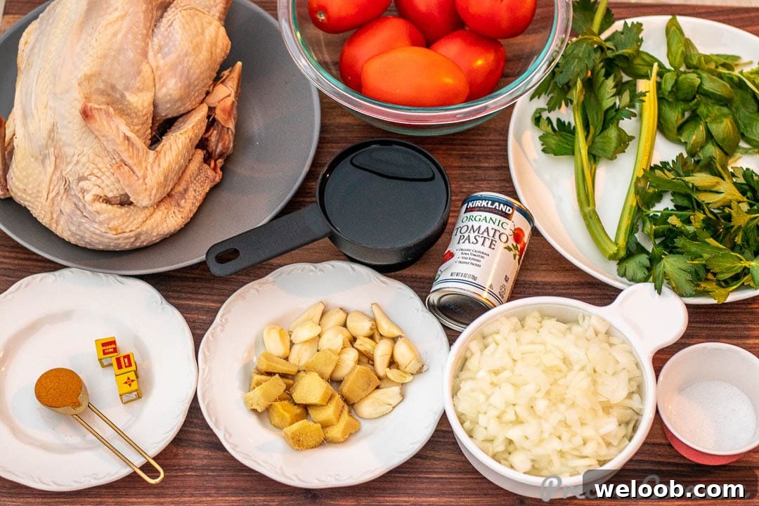 Ingredients for African chicken stew on a chopping board