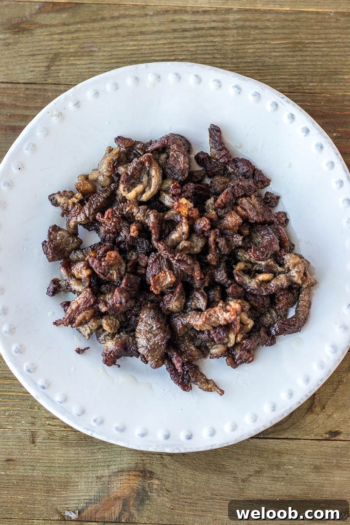 Browned beef on a plate.