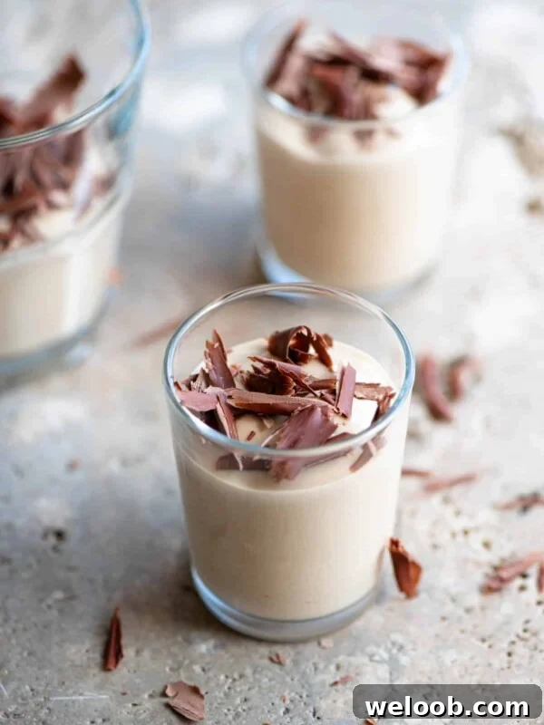 Ricotta al Caffe (ricotta and coffee) in small glasses topped with dark chocolate.